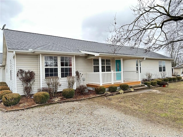 single story home featuring covered porch