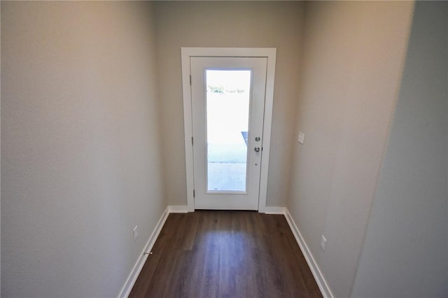 doorway to outside with dark hardwood / wood-style floors