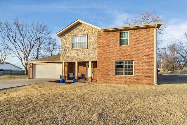 front of property with a garage and a front yard