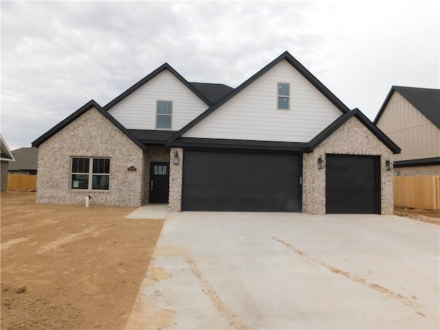 view of front of home with a garage