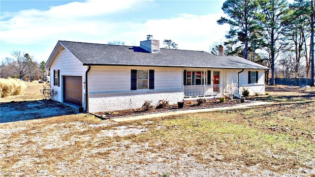 3001 Waukesha Rd, Siloam Springs, AR 72761 - ranch-style house with an attached garage, a chimney, a porch, driveway, and brick siding