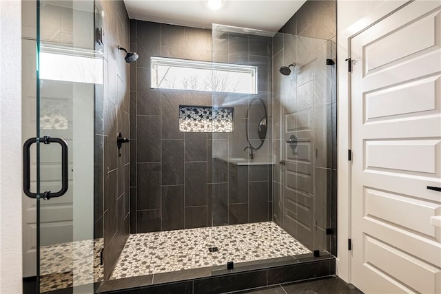 bathroom featuring an enclosed shower