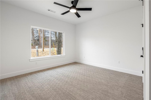 carpeted empty room with ceiling fan