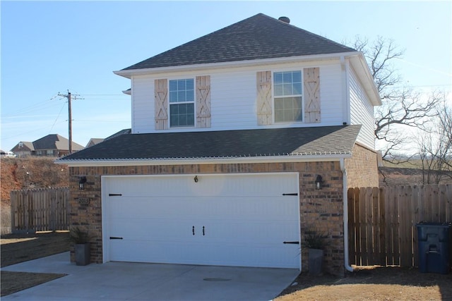 view of side of home with a garage