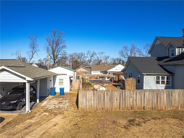 view of yard with a carport