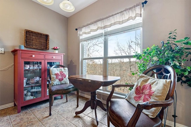 sitting room with light tile patterned flooring