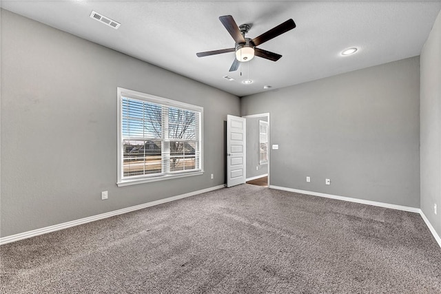 unfurnished bedroom with carpet floors and ceiling fan