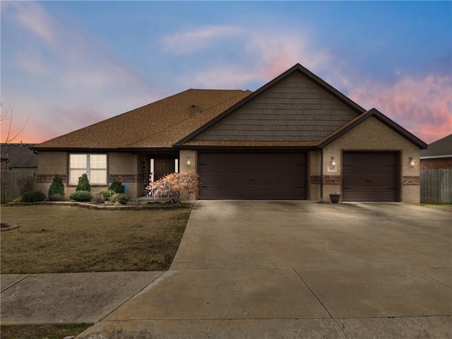 view of front of property featuring a garage