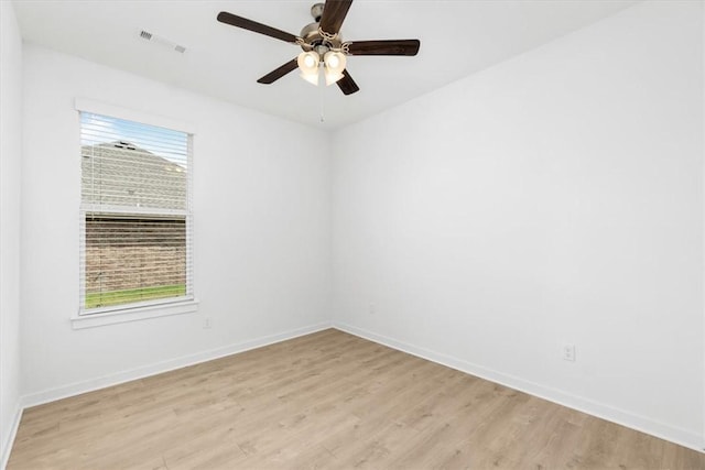 unfurnished room featuring ceiling fan, plenty of natural light, and light hardwood / wood-style floors