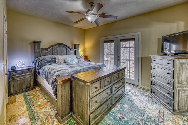 bedroom with access to exterior, ceiling fan, and french doors