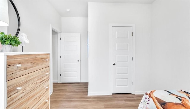 unfurnished bedroom with light hardwood / wood-style floors