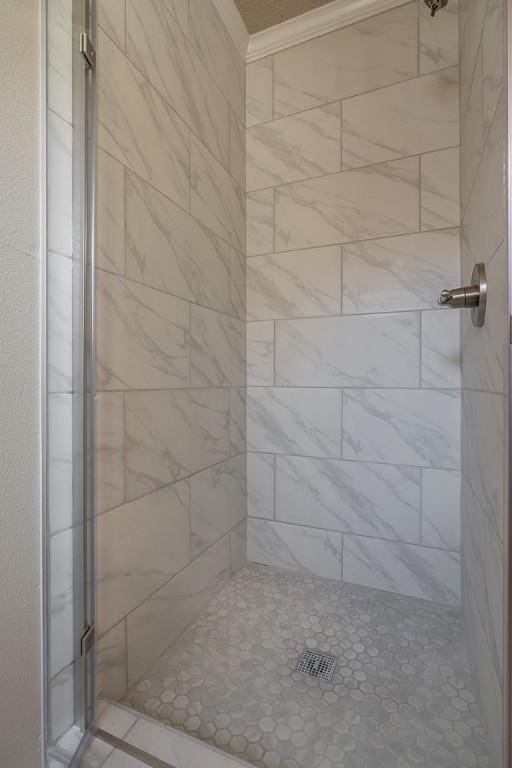 bathroom featuring a stall shower