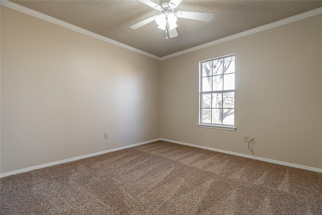 carpeted spare room featuring a textured ceiling, crown molding, ceiling fan, and baseboards
