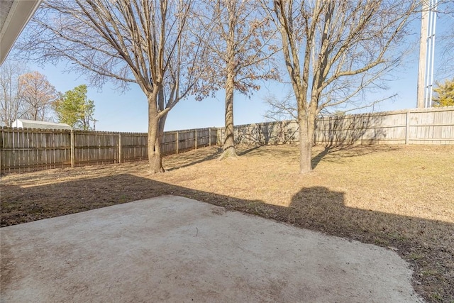 fenced backyard featuring a patio area