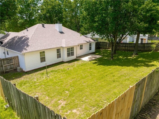 1678 Oxford Pl, Springdale, AR 72764 - back of property with a patio area, a chimney, and a shingled roof