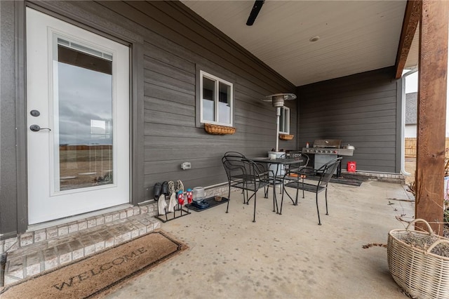 view of patio featuring a grill