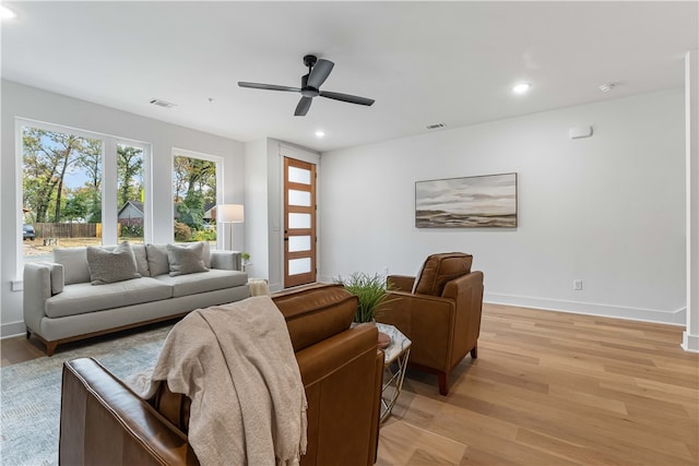 4124 W Olive St, Rogers, AR 72756 - living area with recessed lighting, ceiling fan, visible vents, and light wood-type flooring