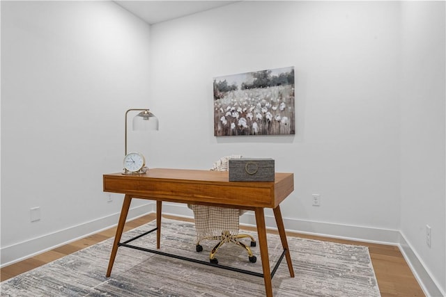 4124 W Olive St, Rogers, AR 72756 - home office with baseboards and wood finished floors