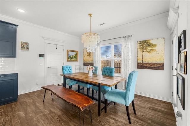 dining space featuring a notable chandelier, crown molding, and dark hardwood / wood-style floors