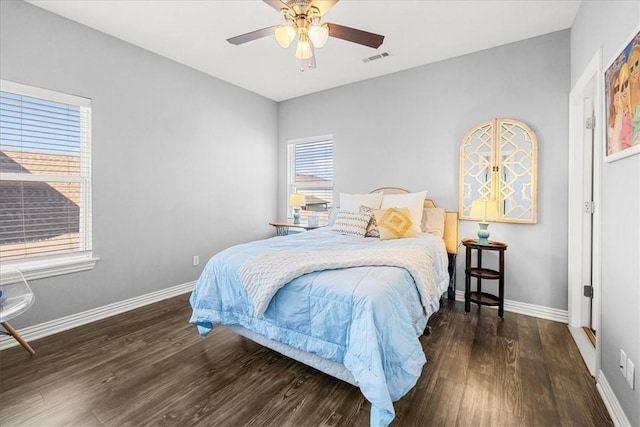 bedroom featuring dark wood-type flooring and ceiling fan