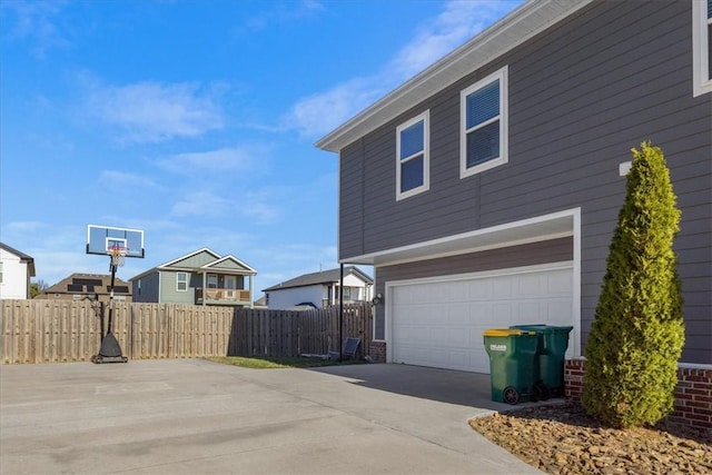 view of side of home with a garage