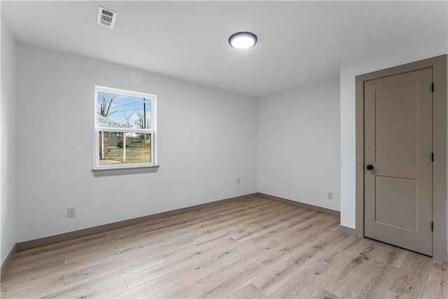 empty room featuring light hardwood / wood-style floors