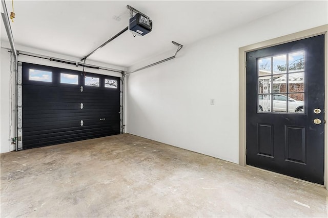 garage featuring a garage door opener