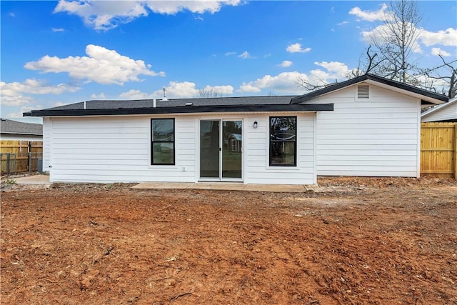 rear view of house with a patio area