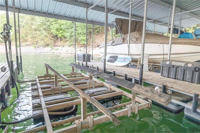 view of dock with a water view