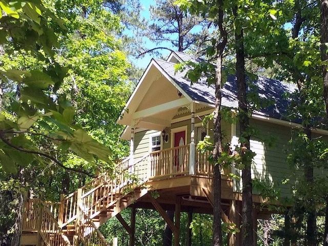 view of side of home featuring a deck