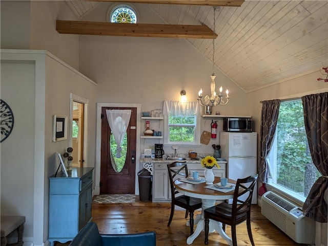 dining space featuring a wall unit AC, dark hardwood / wood-style flooring, a notable chandelier, wooden ceiling, and beam ceiling