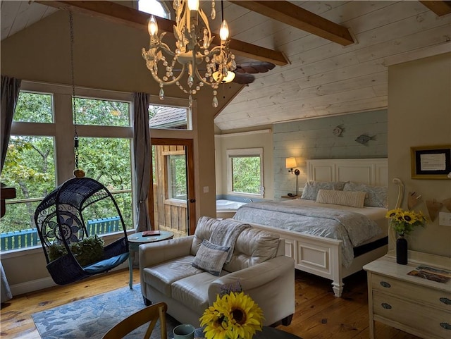 bedroom with wooden ceiling, wooden walls, light hardwood / wood-style floors, and a notable chandelier