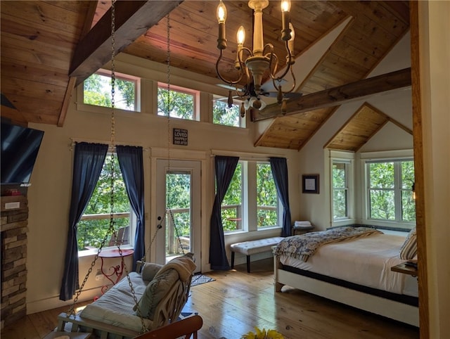 bedroom featuring wood ceiling, a chandelier, lofted ceiling with beams, hardwood / wood-style flooring, and access to exterior