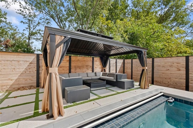 view of pool featuring a gazebo, outdoor lounge area, and a patio area