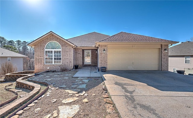 single story home featuring a garage