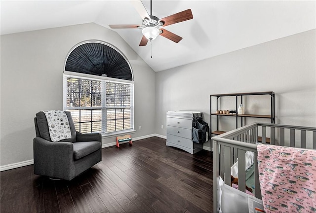 bedroom with ceiling fan, lofted ceiling, and dark hardwood / wood-style flooring