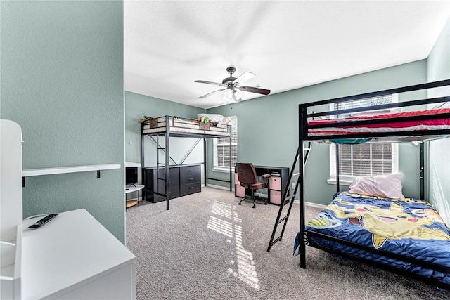 bedroom featuring carpet and ceiling fan