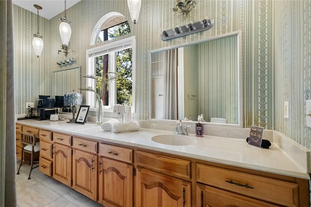 bathroom featuring tile patterned floors and vanity