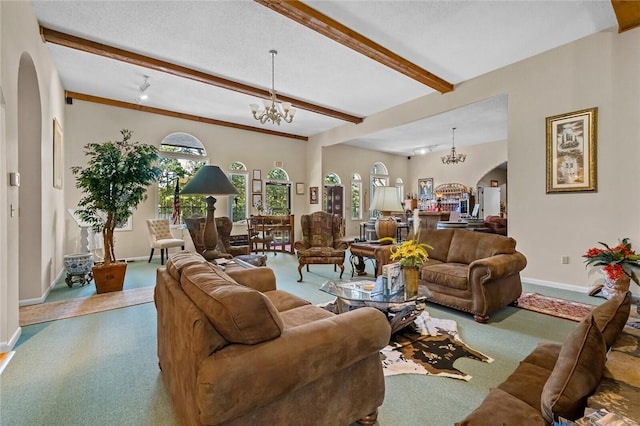 carpeted living room with an inviting chandelier, a textured ceiling, and beamed ceiling