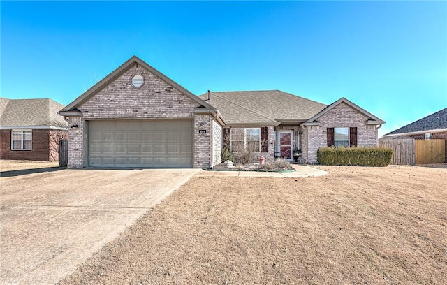 single story home featuring a garage