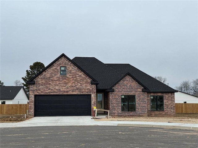 view of front of property featuring a garage