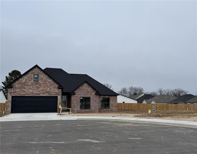 view of front of home with a garage