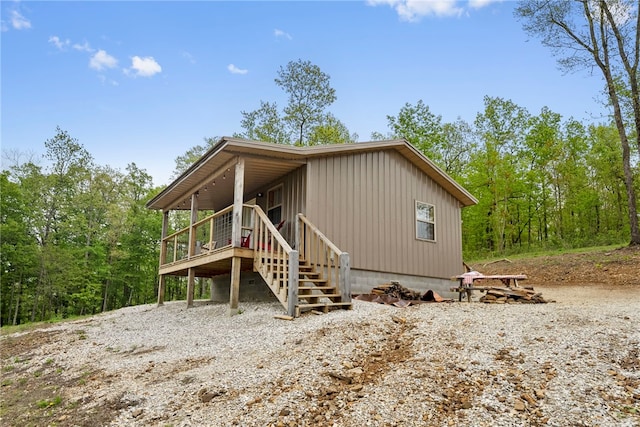 view of front of home with a wooden deck