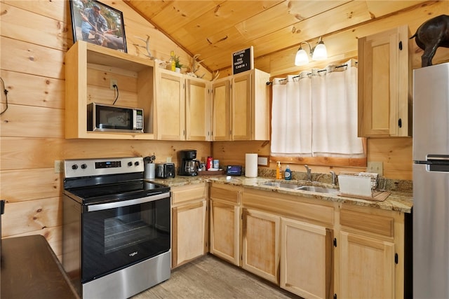 kitchen featuring lofted ceiling, sink, wood ceiling, light brown cabinets, and stainless steel appliances