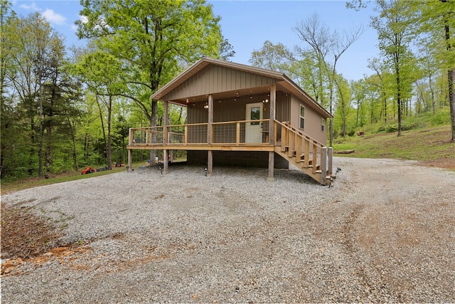 view of front of home with a wooden deck