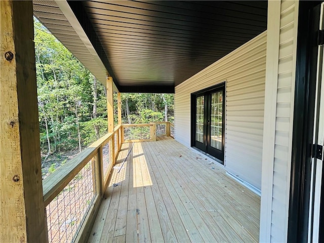 wooden deck with french doors