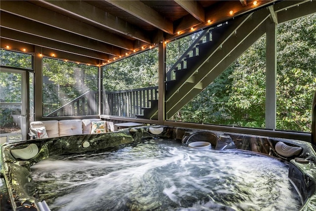 exterior space with a jacuzzi