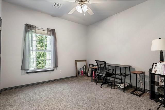 home office with ceiling fan and carpet flooring