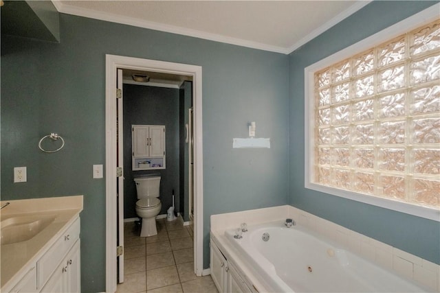 bathroom featuring tile patterned flooring, a bathing tub, vanity, ornamental molding, and toilet