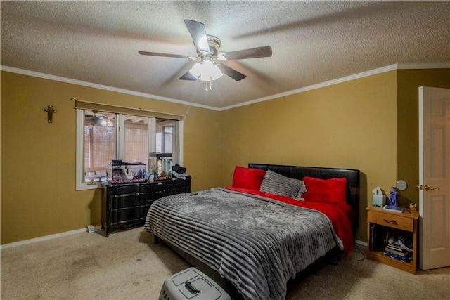 bedroom featuring crown molding, ceiling fan, carpet floors, and a textured ceiling